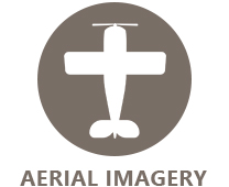 Brown circle with a white airplane in the center.