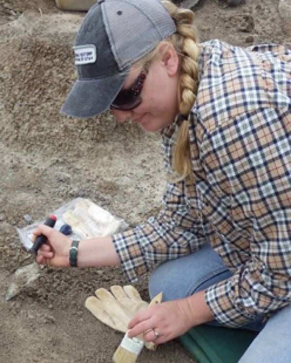 Jessica Appledorn sitting in the dirt