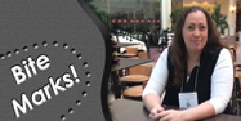 Dr. Drumheller-Horton sitting at a table