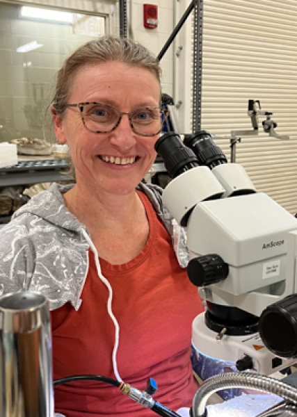 Cathy at a microscope