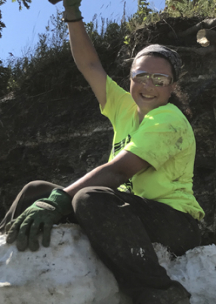 Abby cheering at a successful jacket flip