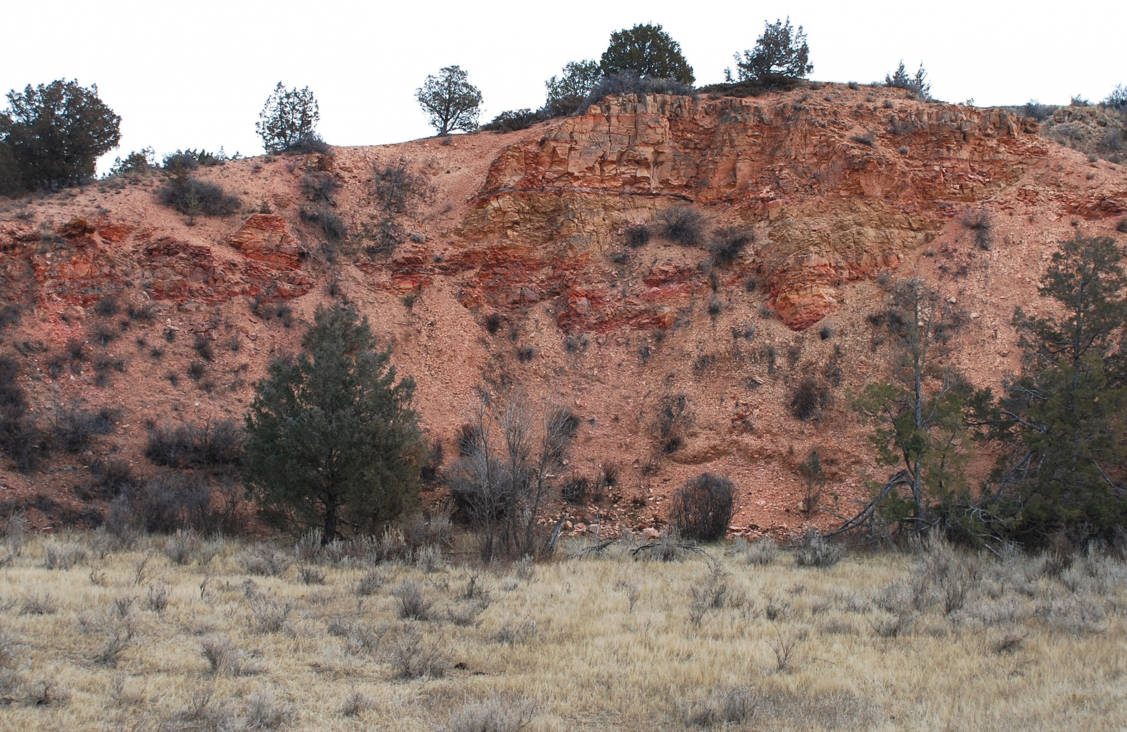 A hill composed of red rocks.
