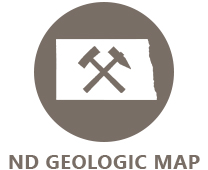 Brown circle with a North Dakota icon and pick axe icon.