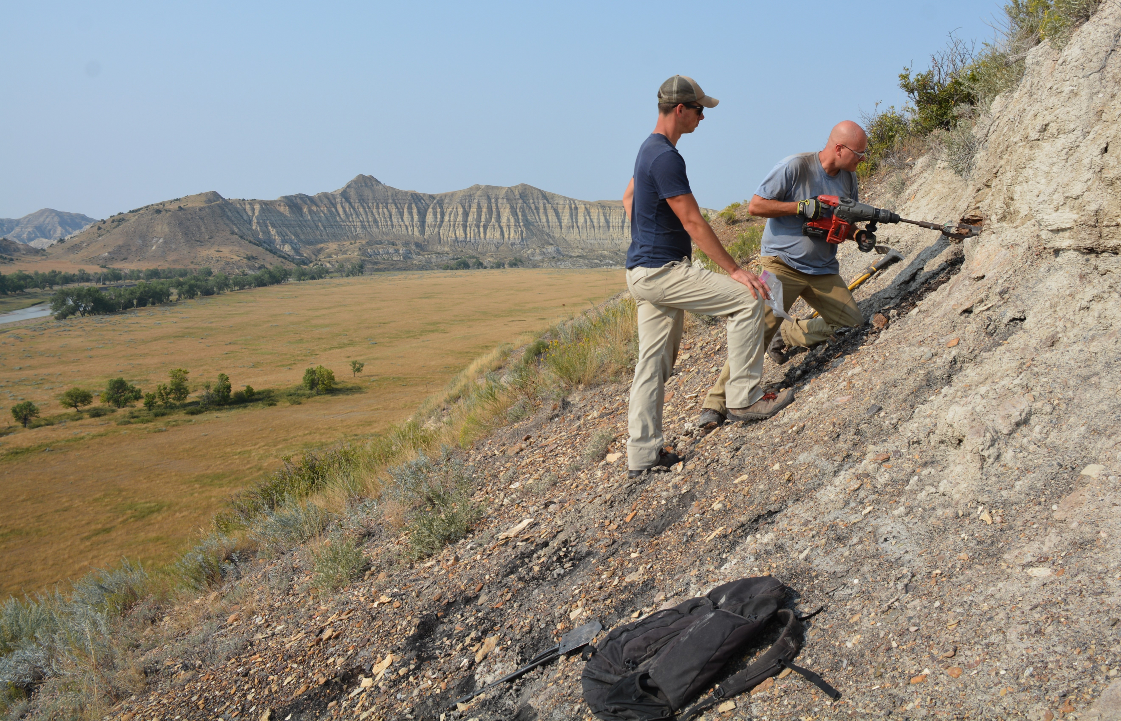 Geological Survey geologists collecting coal samples for the critical minerals study in Slope Co., ND in 2018.