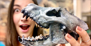 Amy holding up a bone-crushing dog