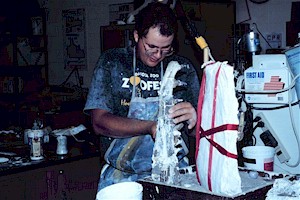 Johnathan Campbell restoring one of the  Plioplatecarpus jaws in the NDGS paleontology laboratory at the North Dakota Heritage Center