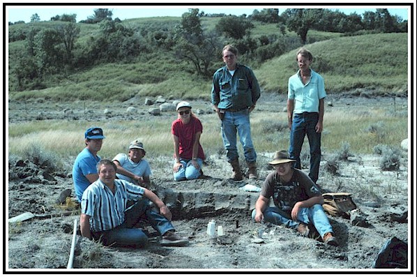 Mike Hanson, Dennis Halvorson, Gene Loge, Beverly Tranby, Orville Tranby, Johnathan Campbell, and Scott Tranby at the mosasaur excavation site
