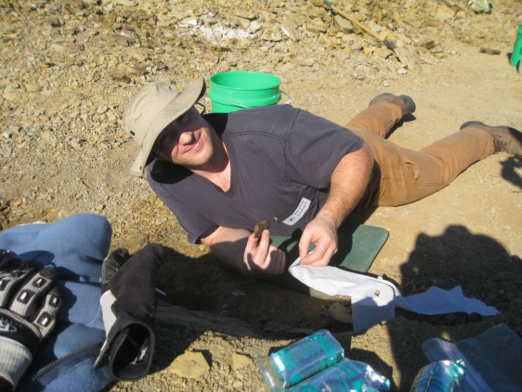 Bryan Barnes wraps up some 60 million year old crocodile poop (coprolite) in toilet paper