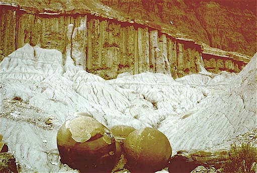Figure 9. Basal Sentinel Butte sandstone. Castellate and rill weathering, as well as a variety of concretions, characterize this unit.