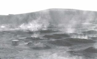 Open burning near Belfield (Slope County) of uraniferous lignite to produce an ash concentrate. 