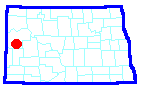 Map showing location of picture taken Throughout much of Dunn and Stark counties the 20 to 30 foot thick Bear Den Member is predominantly white in color. 
								This white color can be seen here in this outcrop north of Grassy Butte in McKenzie County. 